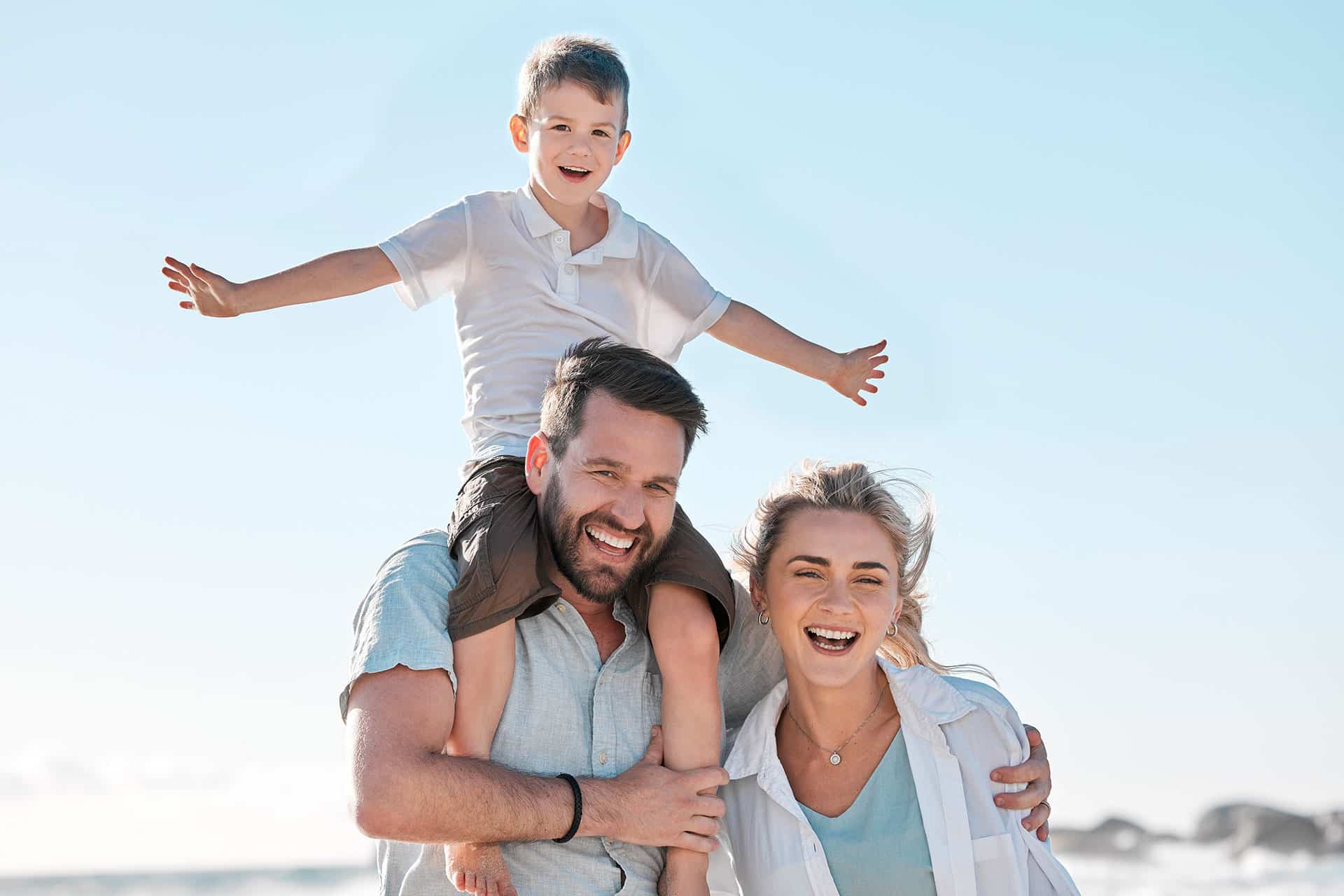 Family enjoying a day at beach.